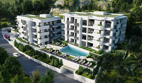 New modern building in Petrovac in a complex with a swimming pool, Budva